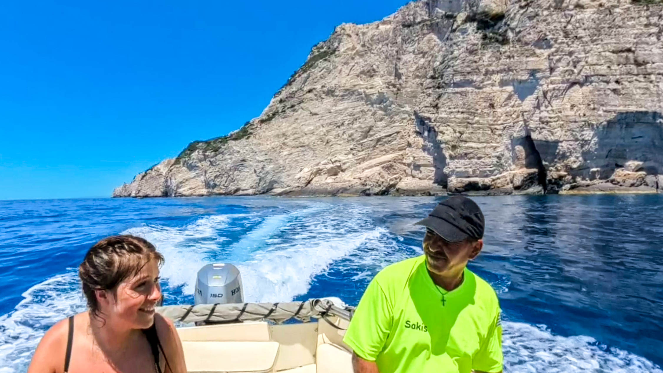 Home page guest driving boat with captain sakis 4